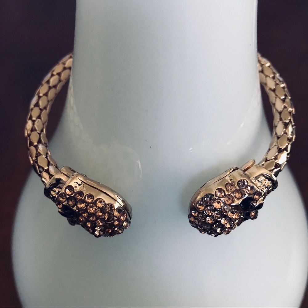 Unisex | Gold Tone and Amber Glass Skull Bangle